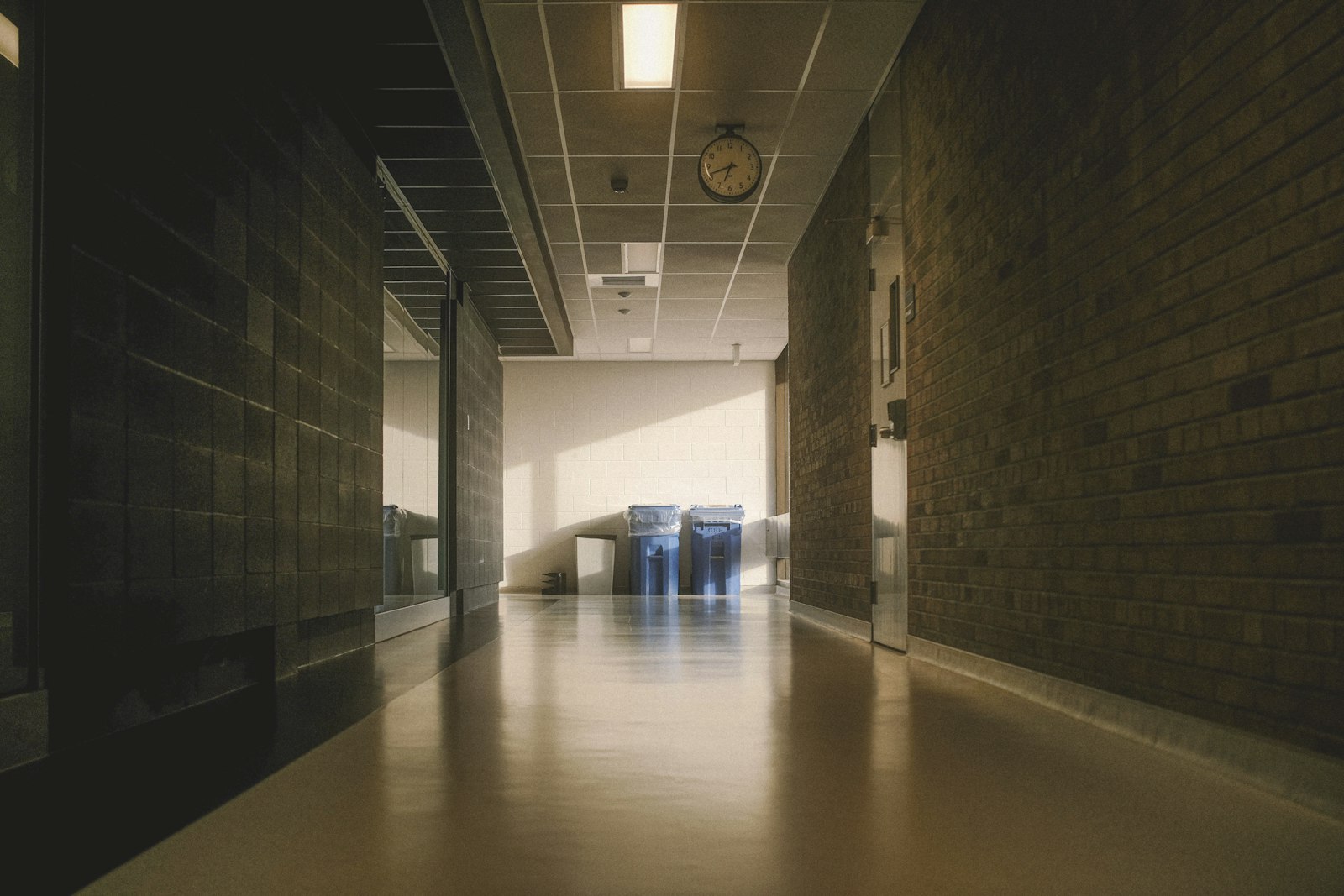 An empty school hallway at dusk