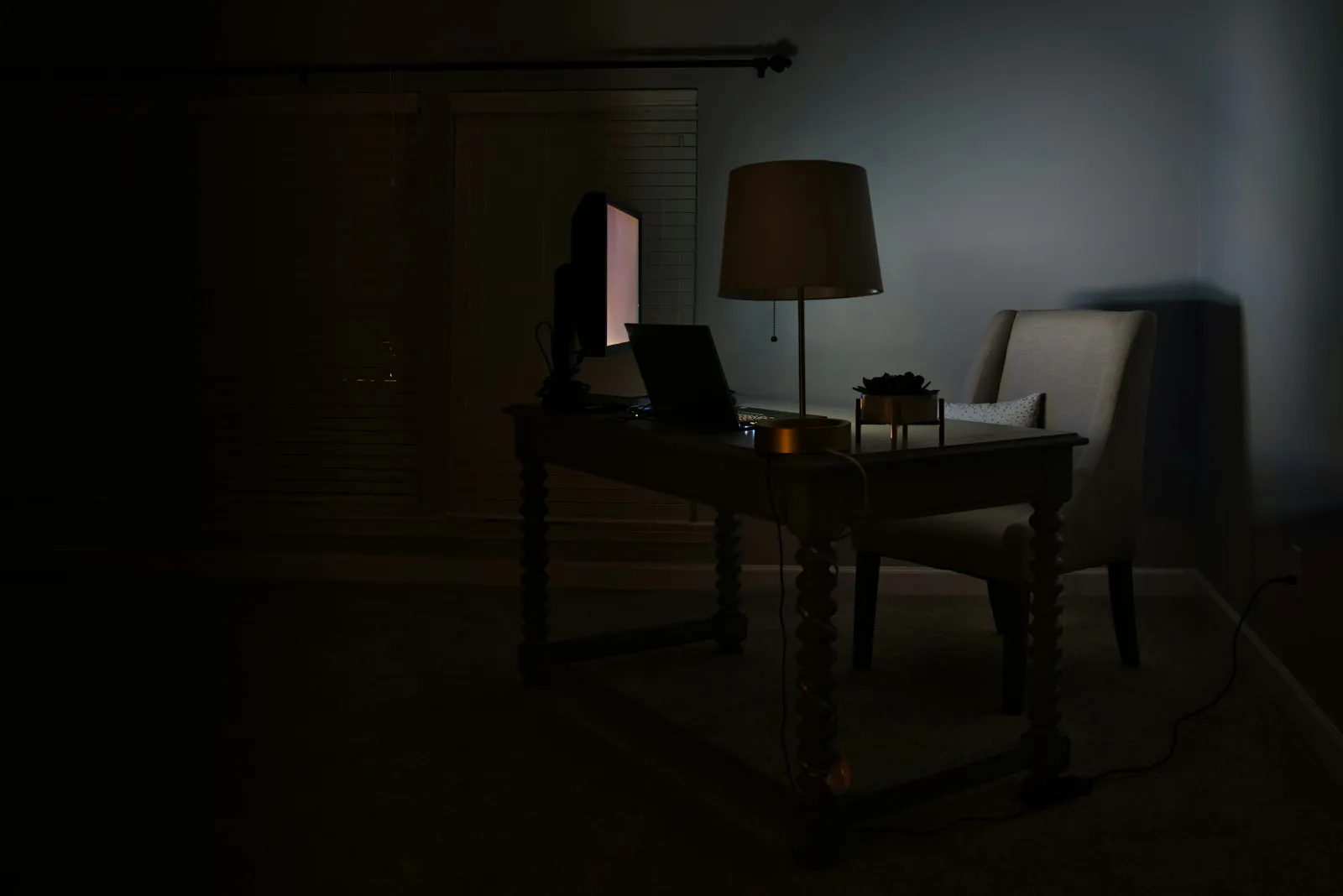 A phone screen in a dim room
