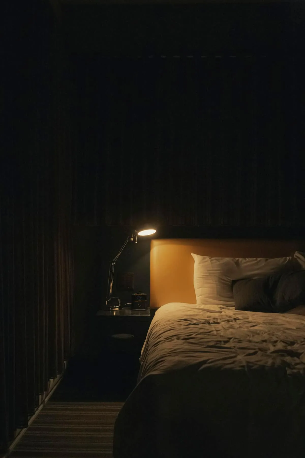 A blurred glow from a smartphone in a dark room